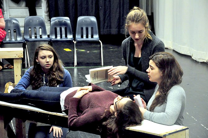 The girls of Salem try to revive Betty Parris, played by Rachel Mayman, during Langley High School’s upcoming production of "The Crucible."