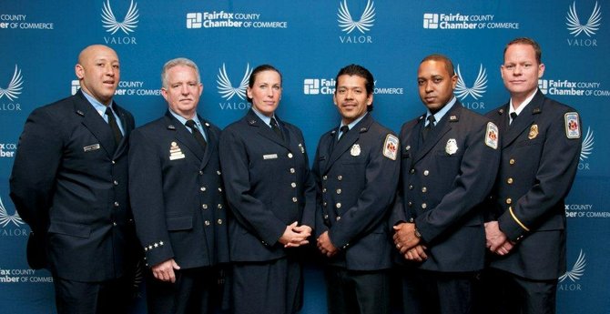 Firefighter Brandon Winfield, Technician Michael Frames, Firefighter Namaste Bosse, Technician Rolando Contreras, Master Technician Reginald Wadley and Lt. Erick Weinzapfel of Herndon Fire Station 39 were honored March 21 at the Fairfax County Valor Awards for their acts of heroism during the flash flooding of Sept. 8, 2011.

