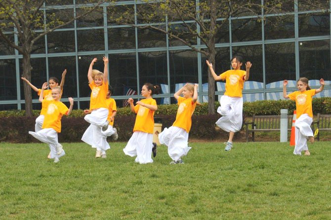 Bringing in some light: The Fairfax-based Children of the Light dance ensemble performed to the song Highly Exalted at the Jubilee Christian Center-sponsored 2012 "Eggstravaganza" on Saturday, March 31, at the Fairfax County Government Center. Formed in 1991, the Christian dance and drama group of children and youth ages 3-18, under the guidance of Director Jeannine Lacquement, are trained in creative dance, mime and choreography. 
 
