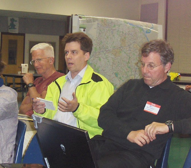 Fairfax resident Douglas Stewart (center) makes a point during the bike-plan meeting.