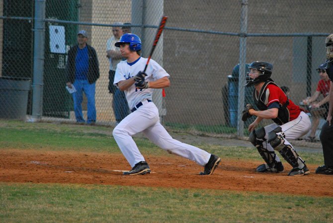 Senior outfielder Michael Francis makes contact at the plate for the Seahawks.  