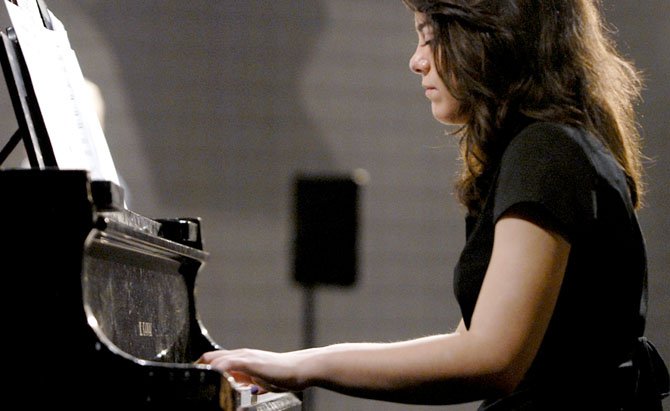 Maddie Rosenstein, a sophomore at Oakton High School, plays the piano for the Oakton High School Jazz Band B.

