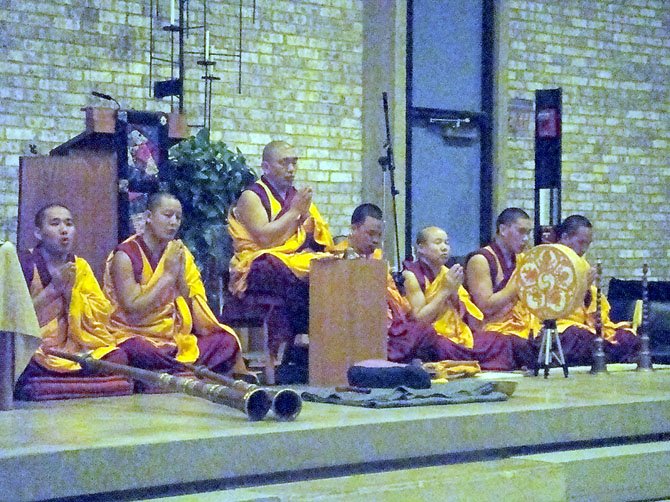 Geshe Dr. Dorji Wangchuk and six monks from the Gaden Jangtse monastery recite a prayer for health at the Unitarian Universalist Church of Arlington on April 9.