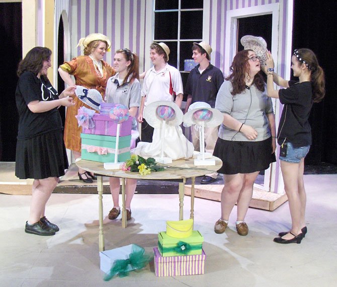 Rehearsing a scene in the show’s hat shop are (from left) Anita Tellez-Mansy, Sean Pugerude, Patty Kelleher, Connor McAlevy, Kevin Pucci, Taylor Kiechlin and Elinor Curry.


