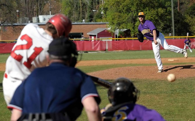 Tom Cresce of McLean High swings at a pitch during the Highlanders’ spring break win over Lake Braddock on April 3. Cresce, a senior, had three of his team’s hits in the win over the Bruins. 