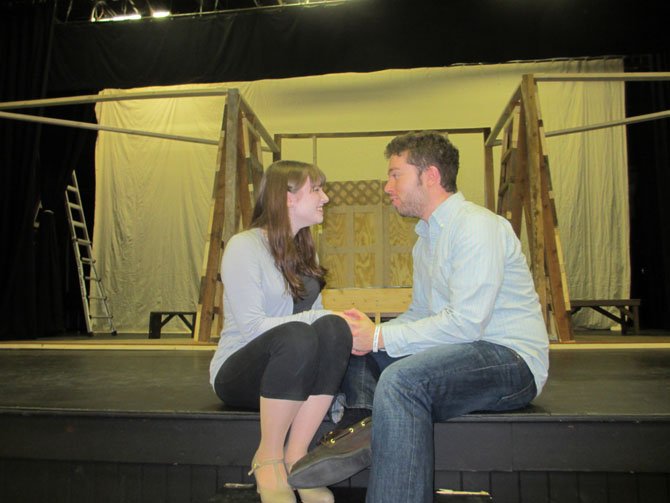 Molly Nuss, as Louisa, and Josh Goldman, as Matt, share a romantic – and musical – moment in the Vienna Theatre Company’s production of ‘The Fantasticks.’