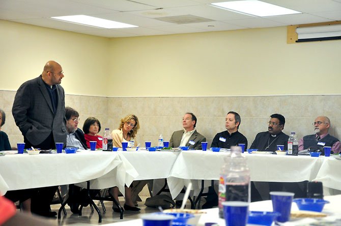 Rizwan Jaka, board member at the All Dulles Area Muslim Society, addresses the idea of interfaith peace and freedom during a Passover Seder held at the ADAMS center Saturday, April 14. 