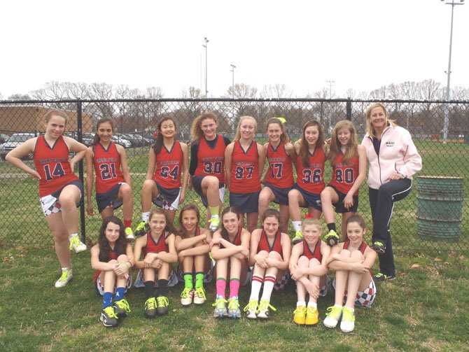 Great Falls Girls U13 Lacrosse team lace-up for pediatric cancer.