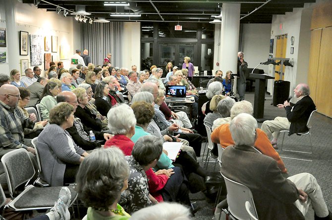 Reston founder Robert Simon tells stories from his early life at the Reston Community Center Lake Anne Thursday, April 19.