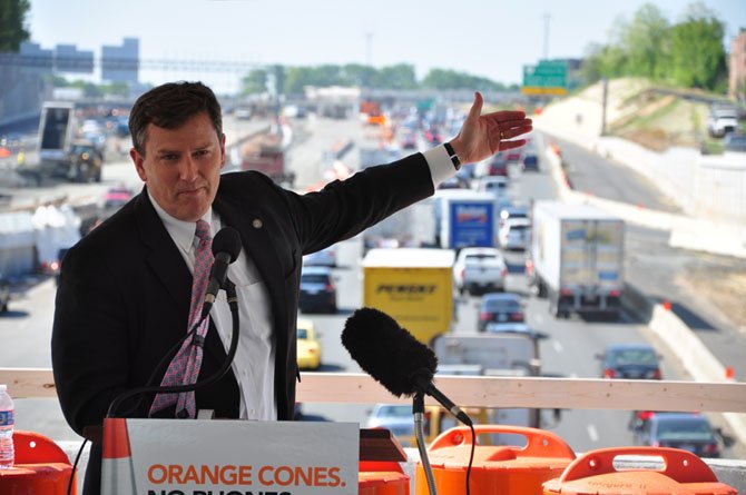 Virginia Secretary of Transportation Sean Connaughton speaks about the importance of stopping distracted driving on the Westpark Drive bridge in Tysons Corner Wednesday, April 25. 