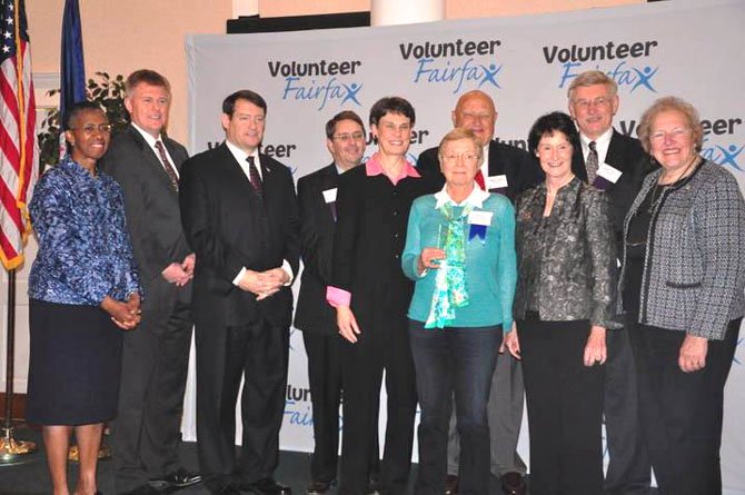 Members of the Fairfax County Board of Supervisors present Vivian Morgan-Mendez with a Fairfax County Government Volunteer award for her efforts coordinating more than 600 volunteers at Vienna's Nottoway Park. 

