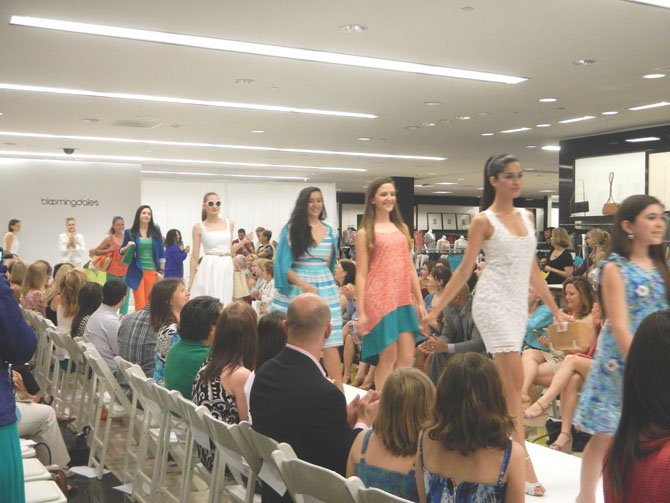 Walking the runway in Bloomingdale’s "must-have selection" for the spring season was a mix of professional models and young volunteers from the D.C. branch of Childhelp Wings. 