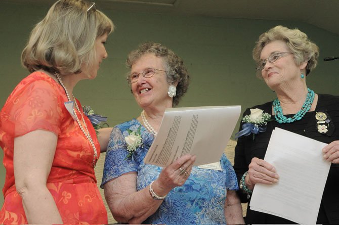 Barbara Kiker, past president, Northern District GFWC (2010-2012), presents club president Lucille Cressey with the General Federation of Women’s Club’s of Virginia, Legislative and Policy/ Best GFWC Small Club — for Legislation and Policy 2012. The award was for hosting U.S. Rep. Jim Moran (D-8) and Chris Zimmerman, Arlington County Board chairman (March 2011) as a program for the March 7, 2011 meeting. Both came to the clubhouse and informed the group and guests what was happening on the local and national level. The club won the Northern District GFWC award earlier this year. Also pictured is Hope Royer, president, General Federation of Women's Clubs of Virginia.