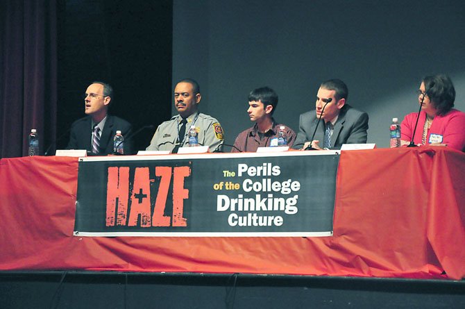 From left, Dr. William Hauda, an emergency room physician at INOVA Fairfax Hospital, Capt. Bruce Ferguson, commander of the Fairfax County Police Department’s Youth Services Division, Ryan Smith, a graduate student at Virginia Tech, Casey Lingan of the Commonwealth’s Attorney’s office and Mary Ann Sprouse, director of Alcohol, Drug and Health Education at George Mason University address parents and students at Herndon High School Tuesday, April 24. 