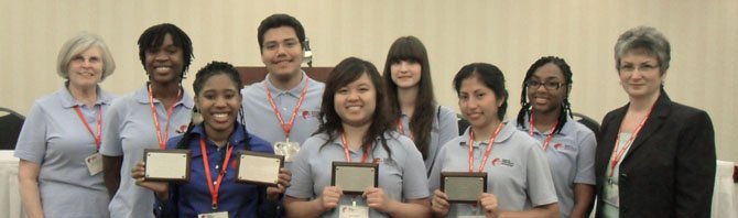 Front row, from left: Shai West, vice president; Kim Tran; and Gabriela Quiroz, president. Back row: Bev Card, advisor; Sammie Oputa, Jonathan Guandique, Anna Martinez, Khortney Hamlin, treasurer; Regina Cronan, FCPS family and consumer sciences program manager.
