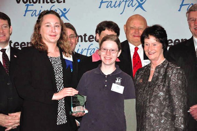 Members of the Fairfax County Board of Supervisors award Rebecca Jewel and Kat Cornell a Volunteer Service Award. Jewel and Cornell accepted the award on behalf of the Fairfax County Animal Shelter Foster Program, which helped foster 410 animals in 2011.

