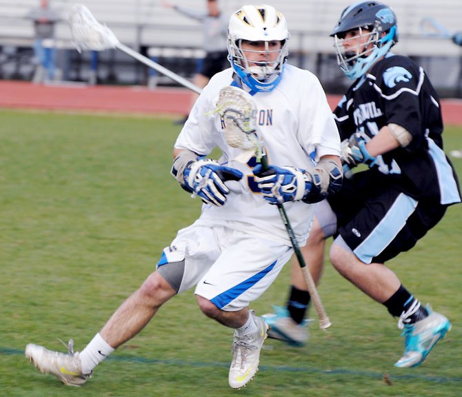 Hunter Jasien, a senior midfielder for Robinson, makes his move with the ball during the Rams' Concorde District home game win versus Centreville on April 24.