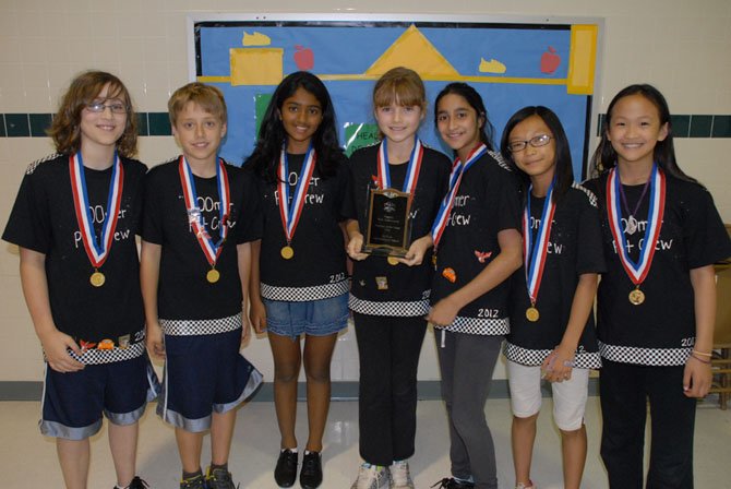 The Hunters Woods Odyssey of the Mind team is composed of fifth graders Charlotte Cai, Yukta Chidanandan, Noah Ginsburg, Wen Ip, Ryan Jones, Maya Nakhre and Charlotte Peterkin. Both teams won first place in regional and state Odyssey of the Mind competitions and are advancing to Odyssey of the Mind World Finals to be held in Ames, Iowa, May 23-26.

