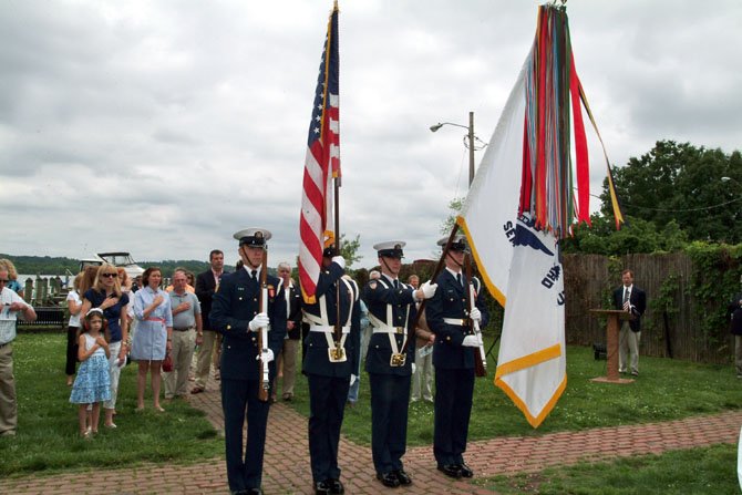 The U.S. Coast Guard Ceremonial Honor Guard presents the colors prior to the flag raising ceremony May 6 at the Old Dominion Boat Club.
