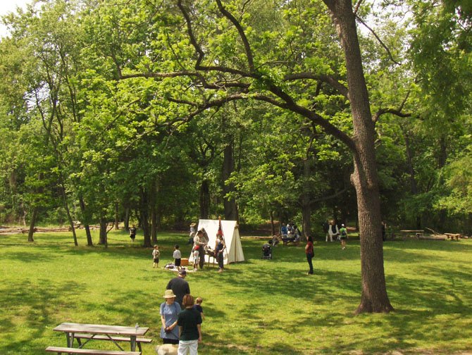 Local residents enjoy themselves, Saturday morning, at E.C. Lawrence Park. The fun included baby animals and a Civil War re-enactor.