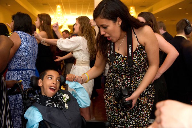 Centreville High School student Faby Argandona dances with her peer and ‘Best Buddy’ Juwaan Espinal. This year, 179 students from eight schools participated in the three-and-a-half hour event. The Best Buddies program creates opportunities for students with intellectual and developmental disabilities to develop on-to-one friendships, integrated employment and leadership development by matching them up with student volunteers.