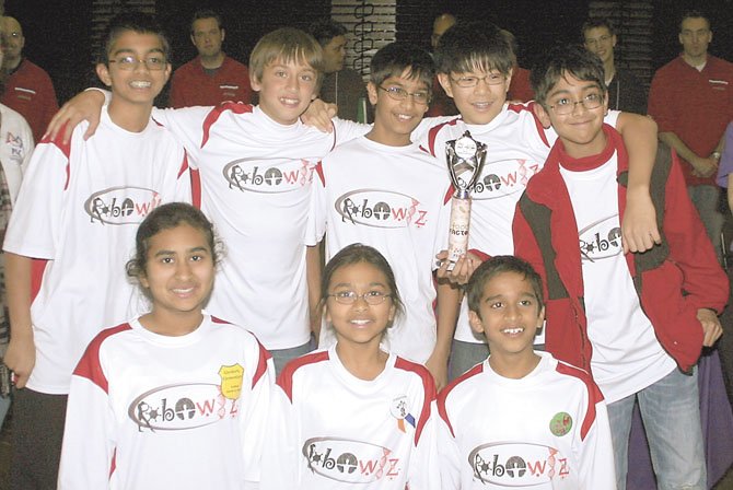 Members of Team Robowiz (back row, from left) are Adithya Varadan, Daniel Mitchell, Neeraj Prasad, Jami Park and Shomik Ghose, and (front row, from left) Abha Agrawal, Nitya Agrawal and Akshay Balaji.