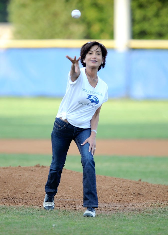 Prior to South Lakes’ baseball game versus visiting Madison on Tuesday, May 1, Dr. Alli Guleria of Guleria Orthodontics, a grand slam sponsor of the Seahawks’ baseball program, threw out the first pitch. (It was a called strike).