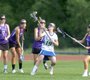 Robinson's Megan Barlow is surrounded by Chantilly High ...