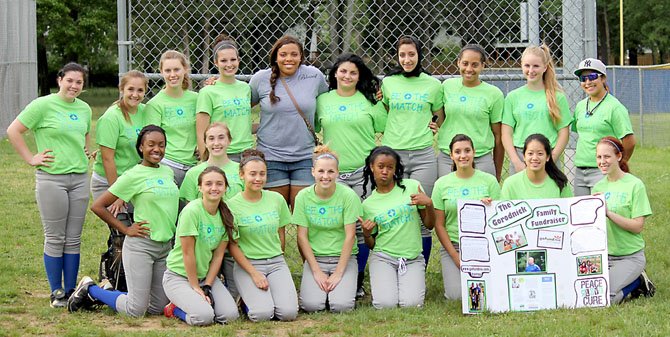 The Lee High girls' softball team gathered for a photo at the benefit game on May 7. The team's players designed special game shirts for the contest, which honored former Robinson head coach Barry Gorodnick, who passed away on Saturday, May 12. Dorian Shaw (top row, middle), a former Northern Virginia softball star, was a special guest at the tribute game.  