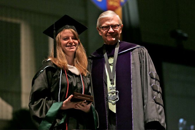 Rebecca Koenig, from Springfield, was the recent recipient of the 2012 Lord Botetourt Medal at William & Mary’s Commencement on Sunday, May 13. President Taylor Reveley presented Koening with the award.  

