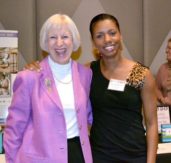 Dr. Venus Opal Reese  (with Carol Plummer, left) encourages women to realize their full potential at a luncheon at Lakewood Country Club in North Potomac.