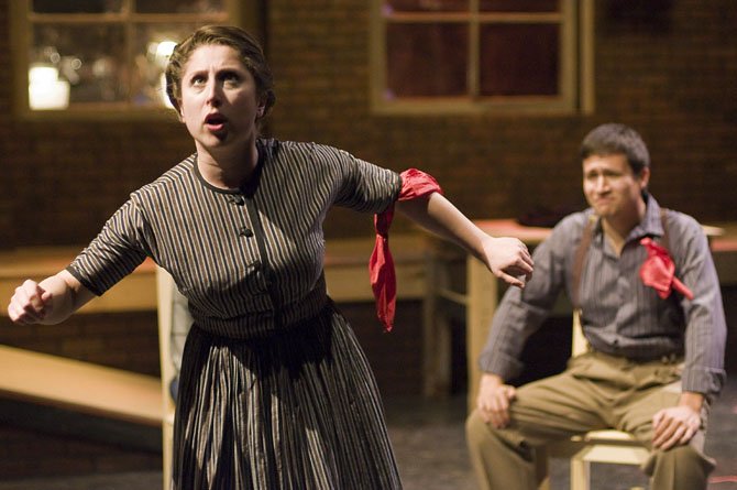 From left: Sherry Berg as Charlotte gives her report to a local Communist Party meeting as Mikey Cafarelli, as a party member, looks on in the 1st Stage production of the musical "Flora the Red Menace," which runs through June 17 in Tysons Corner. 