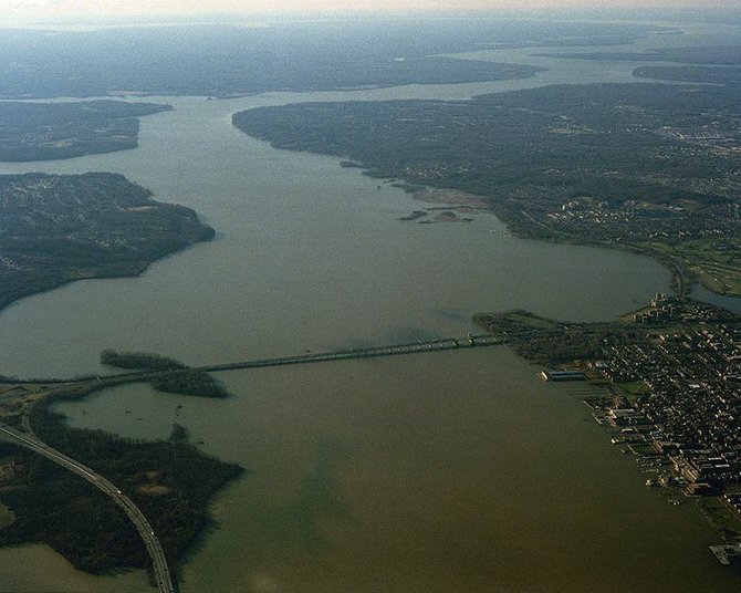 A view of the Potomac River as it flows past Alexandria, Virginia towards its outlet at the Chesapeake Bay.