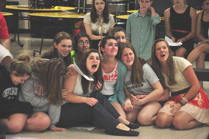 Students at Langley High School rehearse the courtroom scene from "The Crucible," for which they were nominated for five Cappies awards. Langley will perform a three-minute excerpt from the play at the June 10 Cappies gala. 