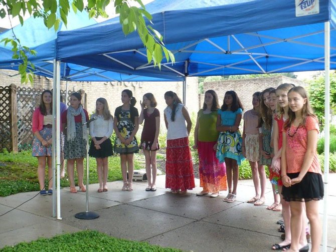 All County Chorus sings "Today is the Day" near the end of the Groundbreaking Ceremony at Wolftrap Elementary School. The chorus members include: Christina Bosco, Anna Carlson, Erin Crowley, Claire DeViney, Johna Ezzard, Gracie Feuchter, Michelle Fuhrer, Sophie Gibson, Sydney Jones, Kelsi Listman, Tulsi Mehta, Kiley Moriarty, Laila Ostapovicz, Neha Reddy, Alexandra Schmitz, Anna Sotelo and Erin Williams.

