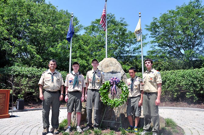 Scouts from Boy Scout Troop 55 at the Great Falls Freedom Memorial Monday, May 28, during the annual Memorial Day ceremony. 