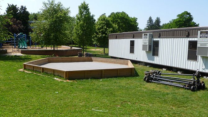 The trailers are located in between the playground and the baseball field in front of the Jamestown Elementary School.