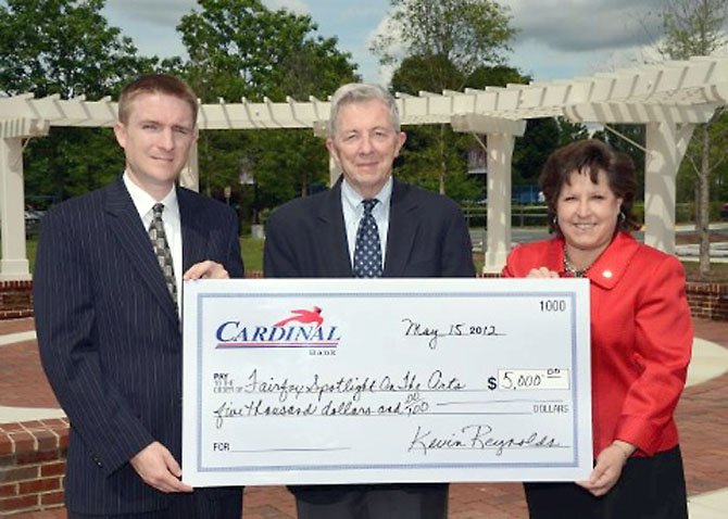 From left, Cardinal Bank Vice President Brad Leiby; President of the Board of Directors for Spotlight on the Arts John Mason; and Cardinal Executive Vice President Eleanor Schmidt. 