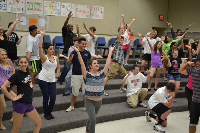 Centreville High’s Concert Choir rehearses for the school’s upcoming “Broadway Pops” choral concert.