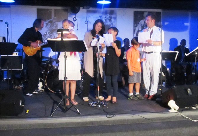 "I Got You Babe." State Sen. Chap Petersen (D-34) brought the house down Thursday, May 31, at his "Young Lawyers" bash when he and his family performed the Sonny & Cher’s hit at ICONS in downtown Fairfax. (From left) Band members: Ida Petersen, Eva Petersen (holding baby Ida), Sharon Petersen, Mary Walton Petersen, Thomas Petersen and Sen. Chap Petersen, who loosened his trademark bow tie for the performance.