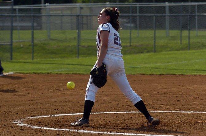 Oakton High sophomore pitcher Allison Davis releases the ball during the Cougars Northern Region semifinals playoff game versus South County on May 30.