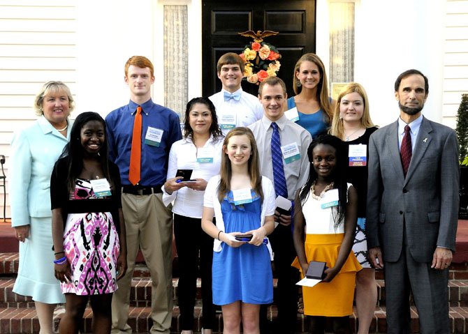 Barbara Doyle with scholarship recipients, Erika Saravia, Bryant High School; Joseph Fitzsimmons, Hayfield Secondary School; Rachelle Powell, Hayfield Secondary School; Ian McKellips, Mount Vernon High School; Valerie Manu, Mount Vernon High School; Benjamin Dougherty, Thomas A. Edison High School; Abigail Jacobs, West Potomac High School; Sarah Jane Underwood, West Potomac High School; along with Ashley McNeff, Chamber vice president, and Dan Storck, Fairfax County Public School Board member.