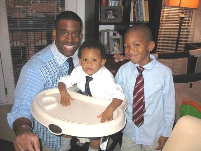 Moses Eric Cobb with sons Barron, 2, and Bryce, 7.