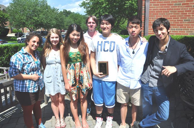 From left, Langley High School junior Rana Halabi, senior Heini Korhonen, junior Jessica Zheng, teacher Chris Bass, senior Brian Chung, sophomore Tony Zheng and sophomore Jeff Waters, members of the Langley High School Community Service club. Chung was named the club’s first ever Volunteer of the Year. Not pictured: senior Lizz Gentry and junior Brittany Kim. 