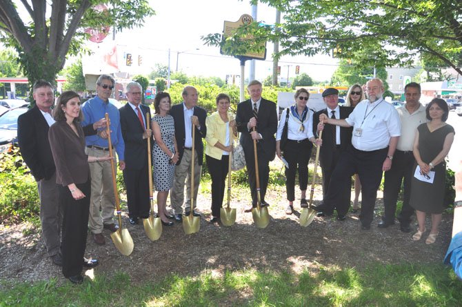 Local officials and landowners break ground on the downtown McLean project to place all overhead utilities at the intersection of Old Dominion Drive and Chain Bridge Road underground Thursday, June 7. 