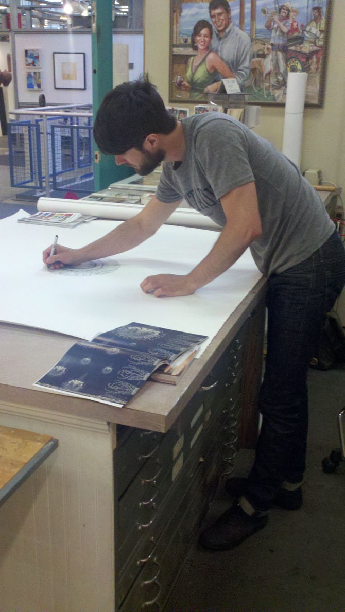 Arlington resident Joseph Shetler prepares work for display. Shetler is one of a select group of artists who will take part in the juried Visiting Artist Program at the Torpedo Factory Art Center in Alexandria. 