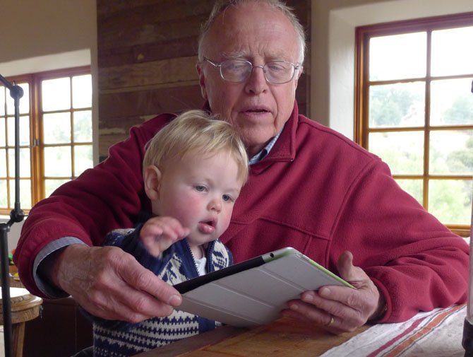 "Grady shows Pop Pop how to use an I-pad:" Harvey Snyder of Arlington, and grandson, Grady Rockwell (age at the time of the photo was 17 months), on Feb  27,  2012 in Topanga, Calif. 