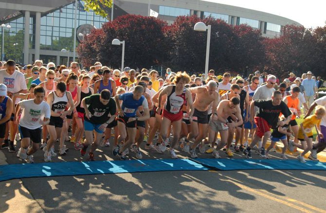 Runners take off at the start of last year’s Tim Harmon Memorial 5K Run/Walk.