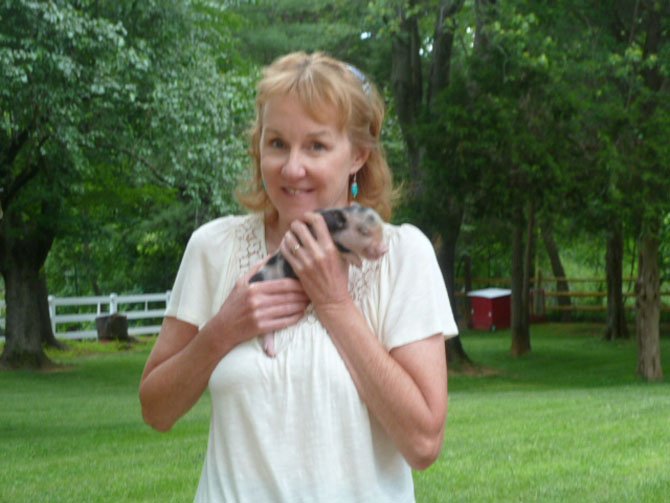 Jill Phillips with one of the petting zoo animals.