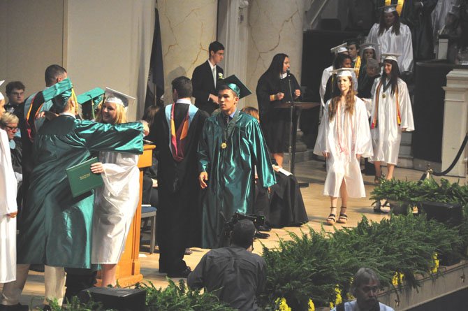 Members of the Langley Class of 2012 receive their diplomas at DAR Constitution Hall Thursday, June 14. 